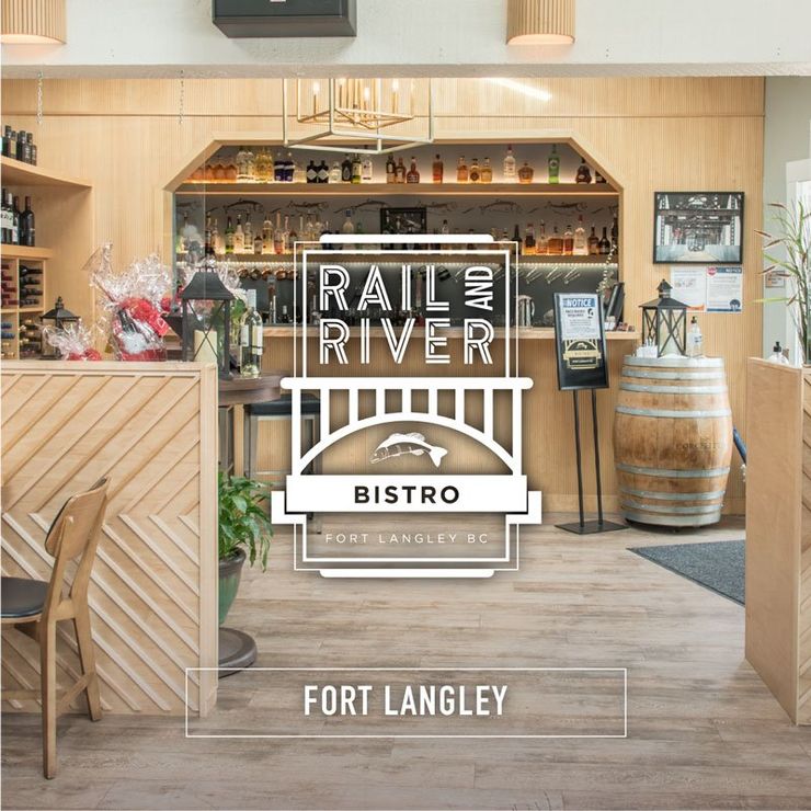 A sign for the rail and river bistro in fort langley