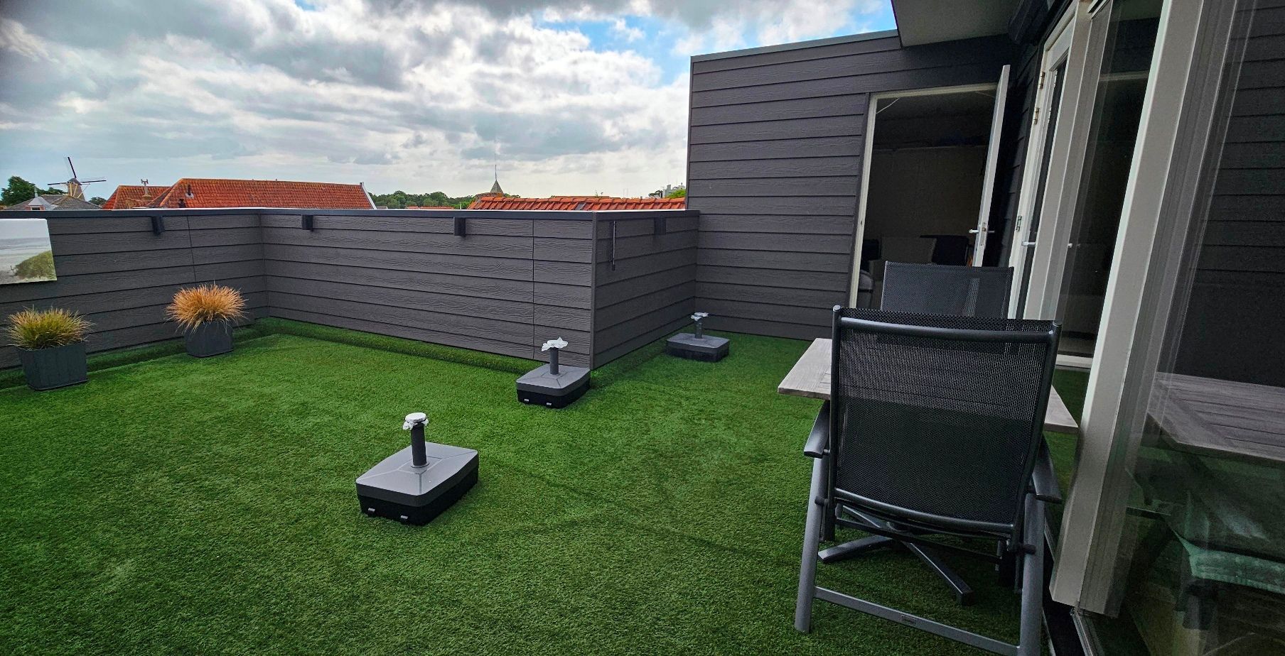 Dakterras op het zuiden met met berging.