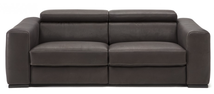 White leather reclining loveseat with adjustable headrests, one seat reclined, in a neutral setting.