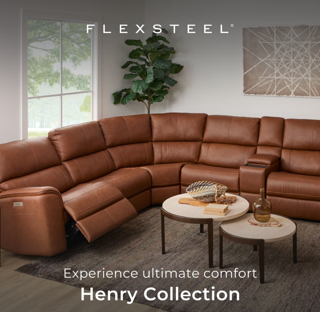 Brown leather sectional sofa with a curved shape and cup holders.