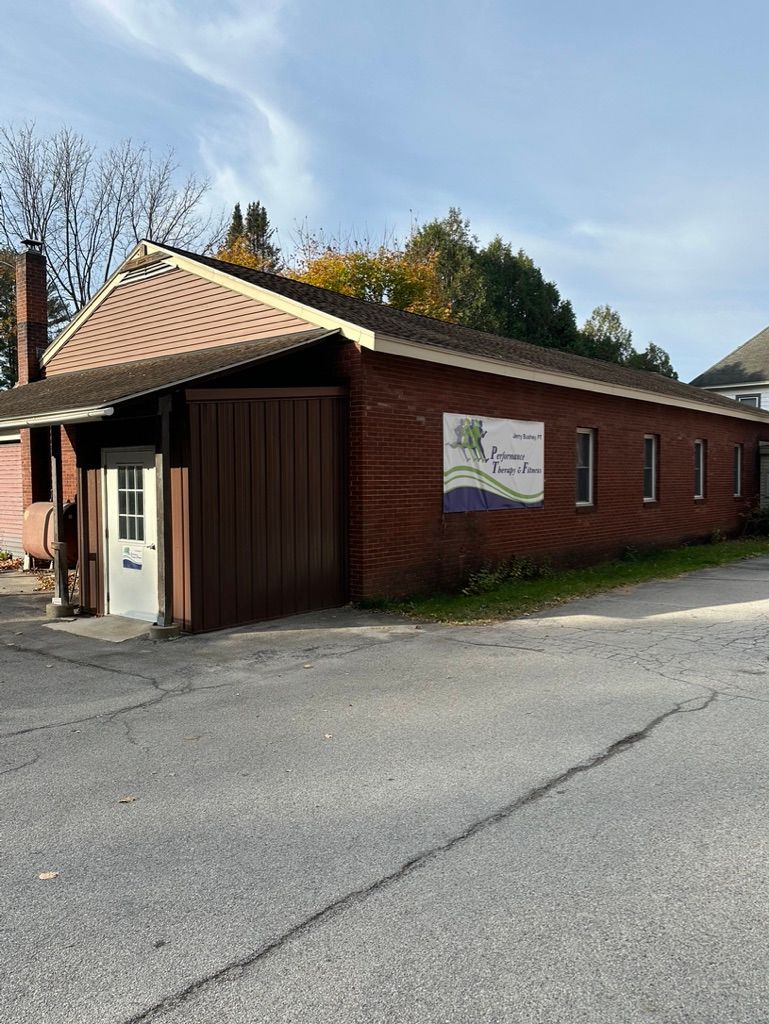 Brick building with sign for 