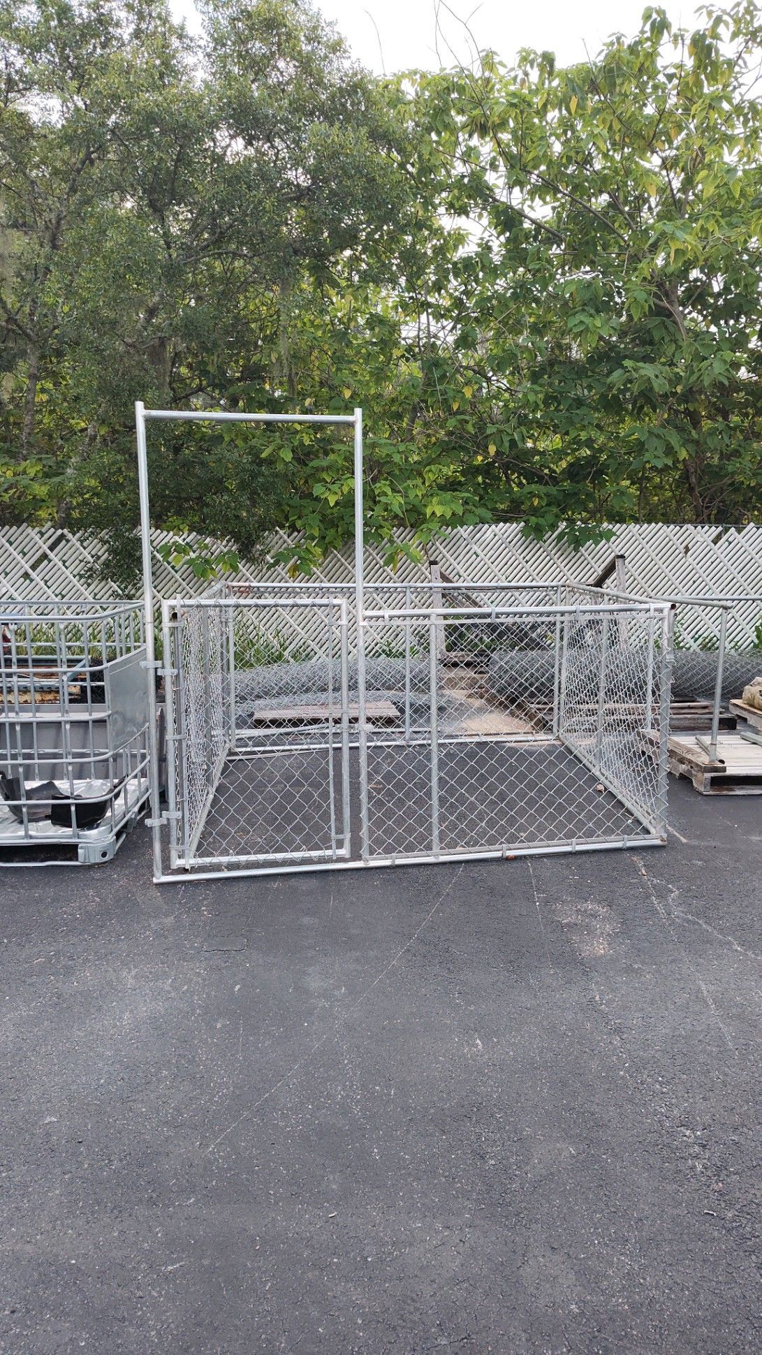 Chain link fence in parking lot, getting ready for install