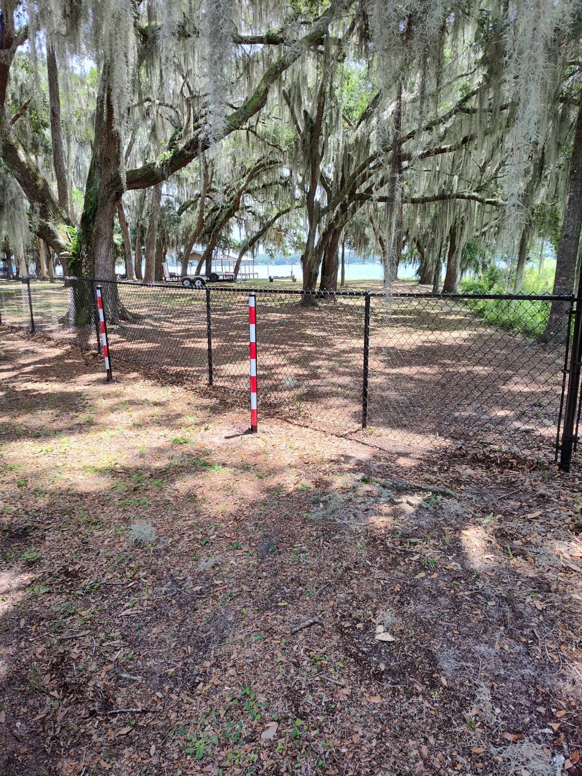 Black chain link fence installation