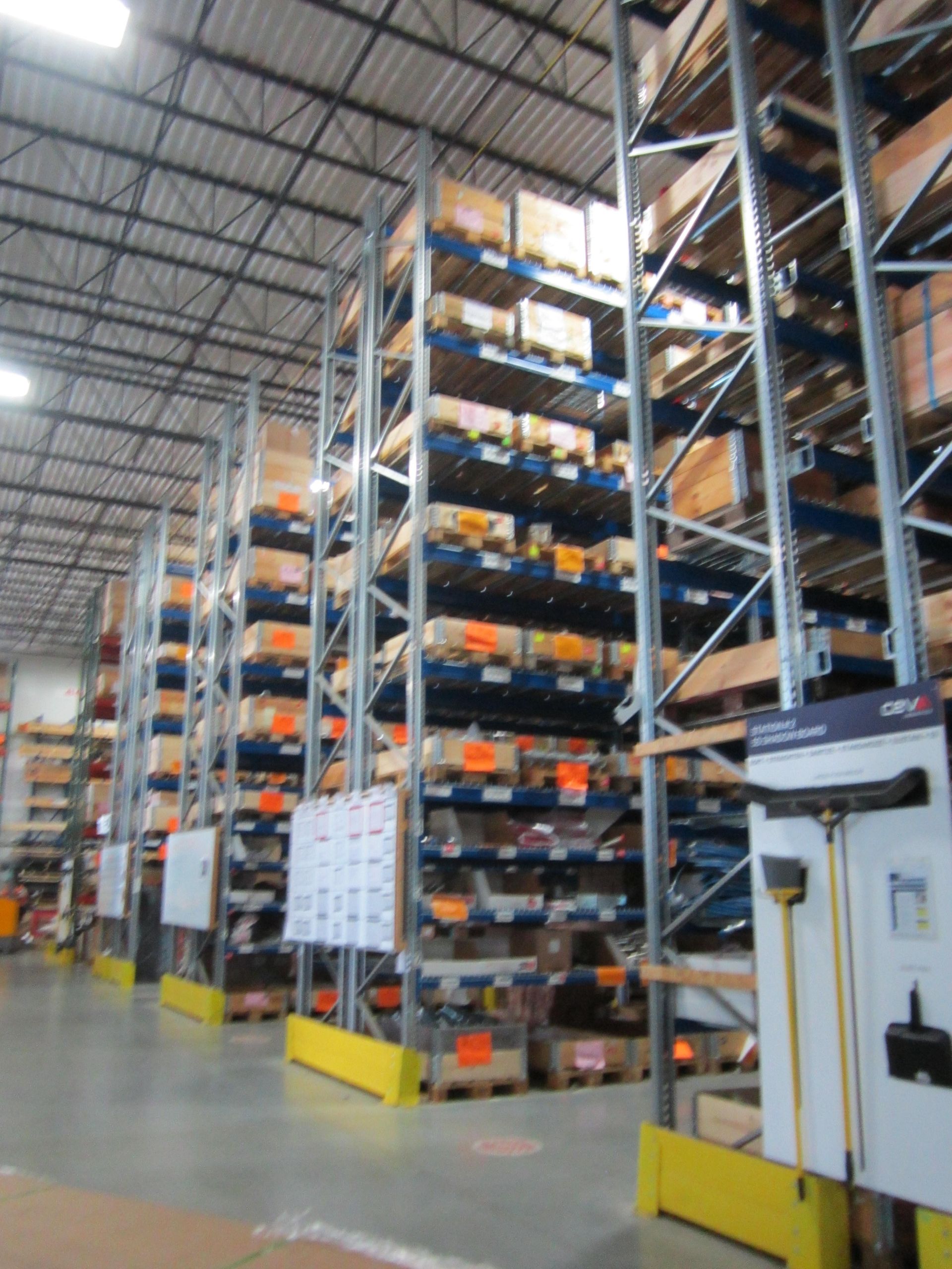 A large warehouse filled with lots of shelves and boxes