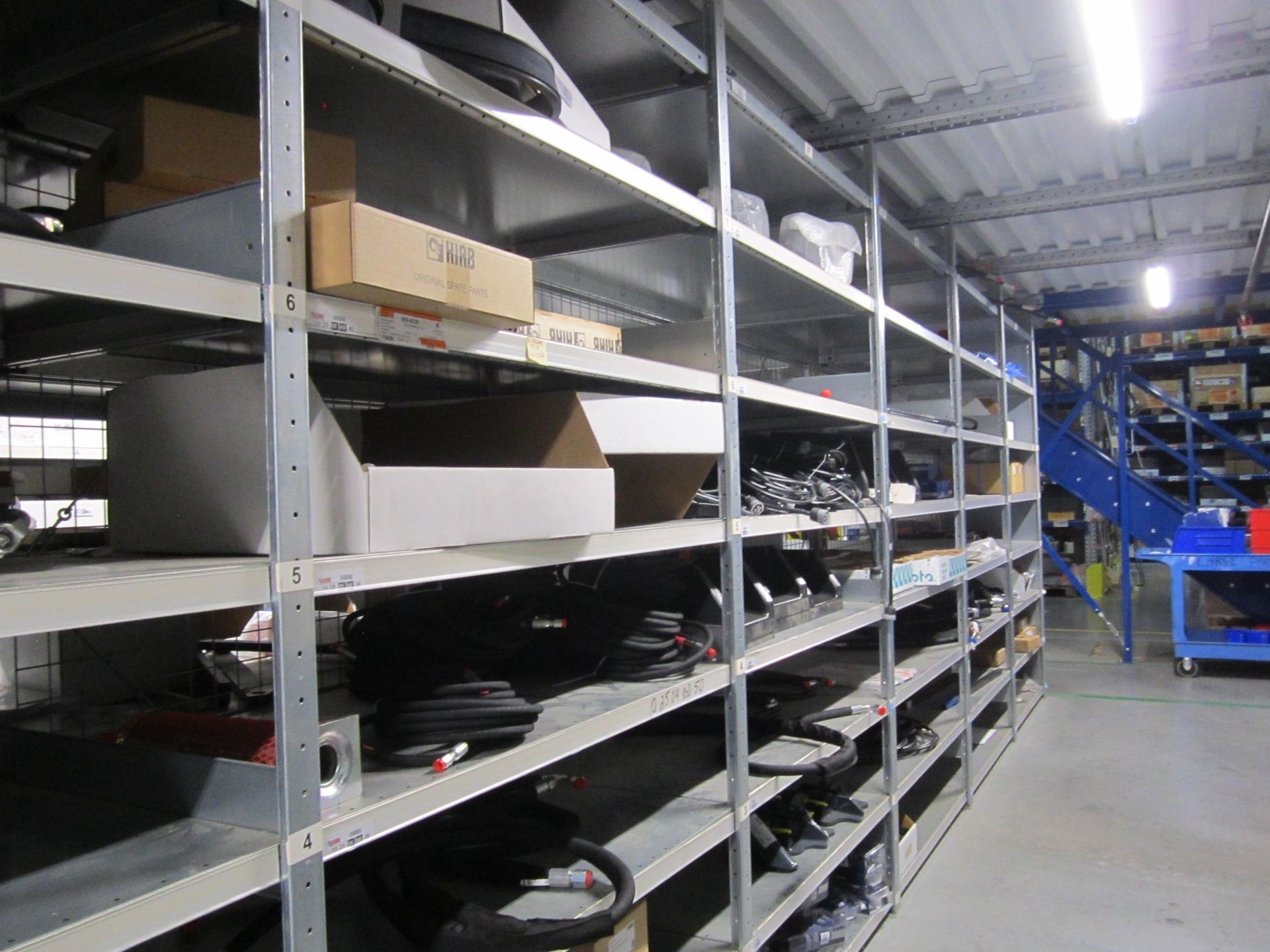 A warehouse filled with lots of shelves and boxes