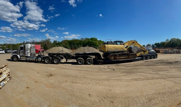 Asphalt paver and crews - Dorr, MI - Black Gold Transport, Inc. Asphalt paver and crews - Dorr, MI - Black Gold Transport, Inc.