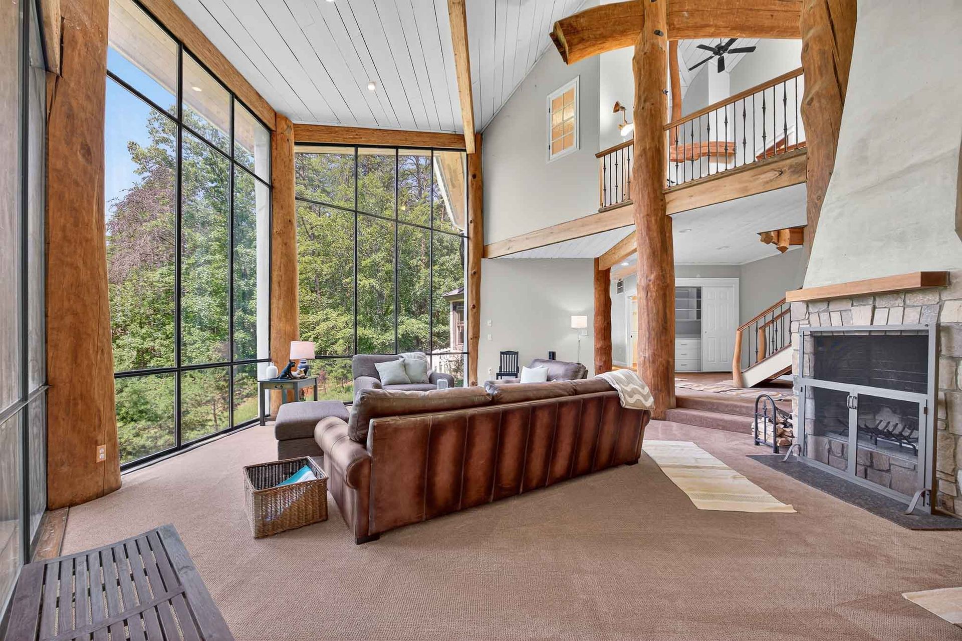Living area with tall windows and natural light