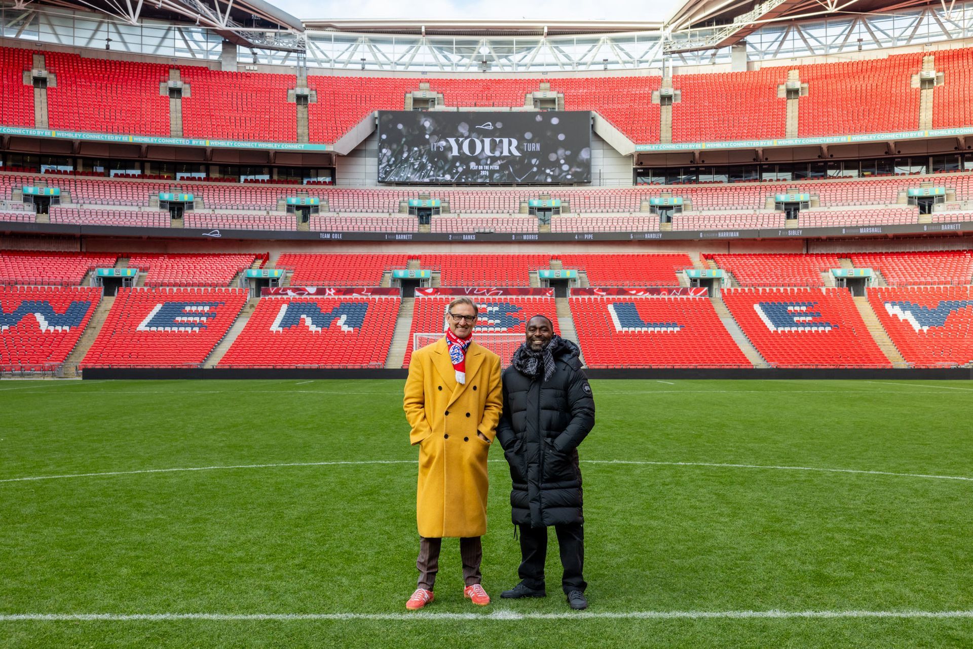 Tony Adams and Andy Cole at Wembley Stadium at a corporate event with instant photography. captured by Ghelani Studios, a London-based event photographer