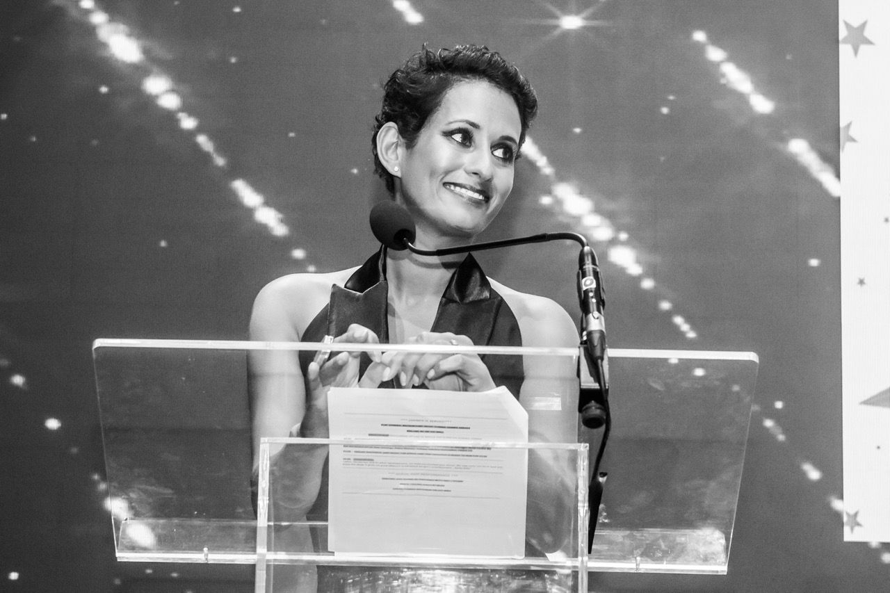 Photo of Naga Munchetty delivering speech at a corporate event in London, by Ghelani Studios