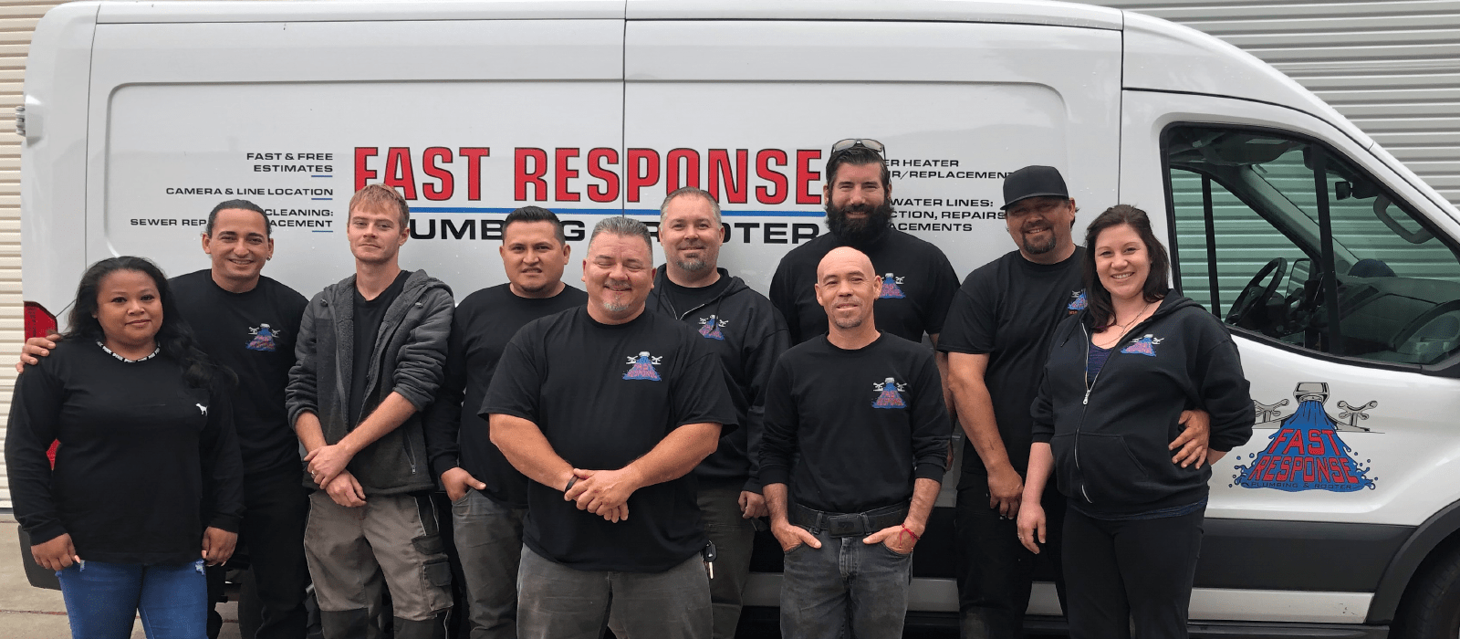 guys standing in front of a van