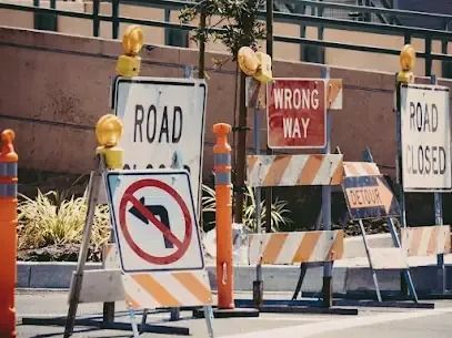 A Road Closed Sign Is Next To A Wrong Way Sign — JW Signs and Designs In Emerald, QLD