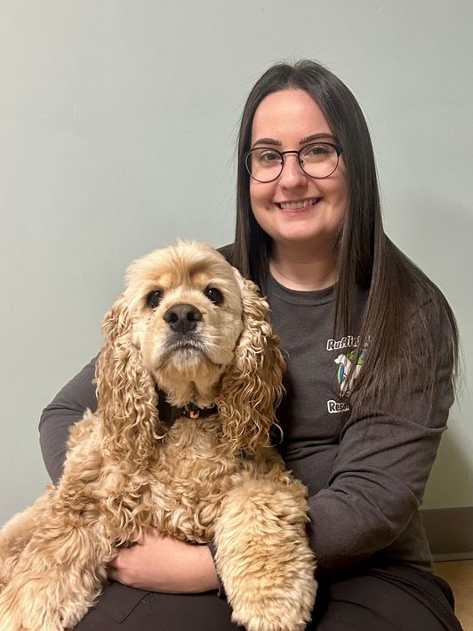 Ruffin' Around employee with her dog.