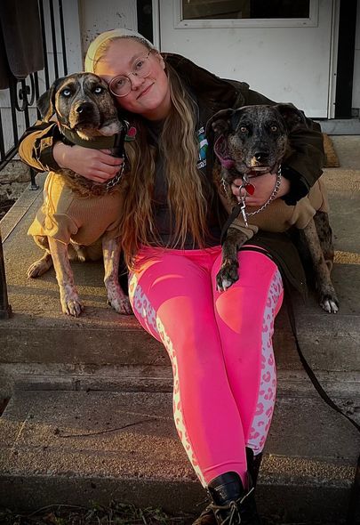 Ruffin' Around employee with her dogs.