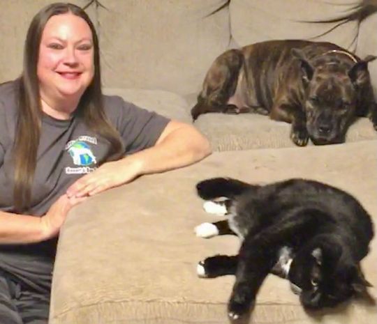 Ruffin' Around employee with her dog and cat.