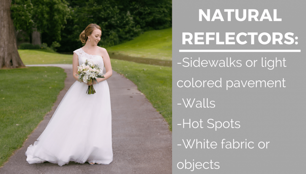A bride in a wedding dress is walking down a path holding a bouquet of flowers.