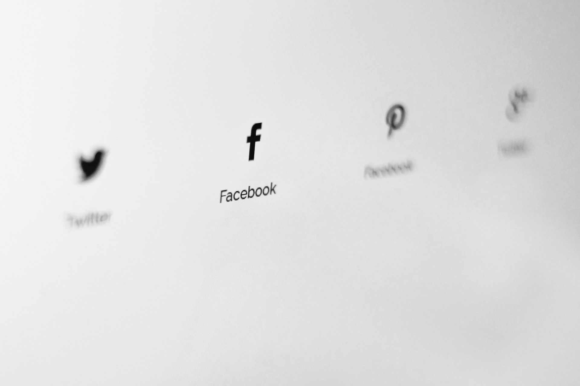 A row of social media icons on a white background.