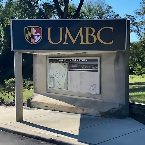 A sign for umbc with a map on it