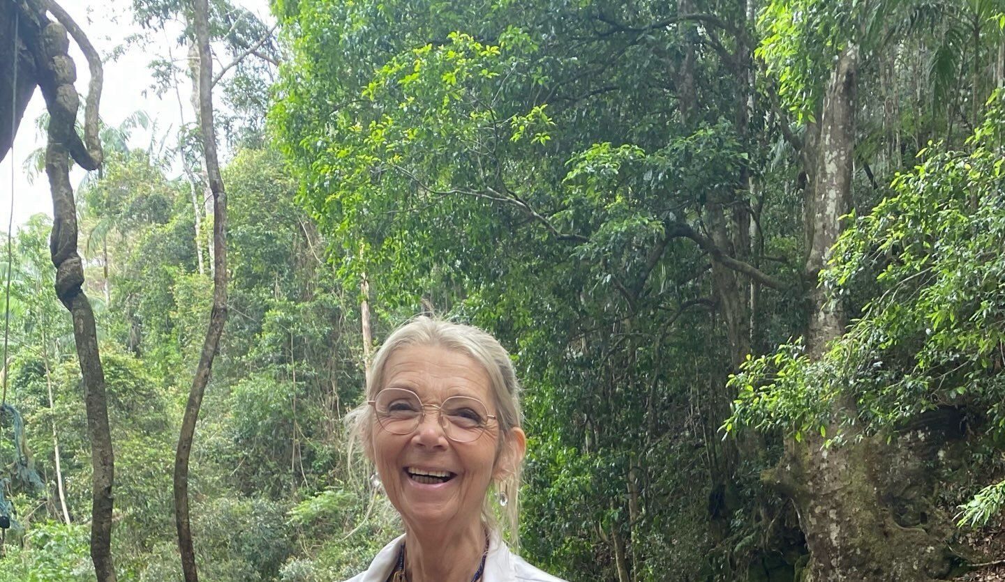 Sandie smiling in the rainforest