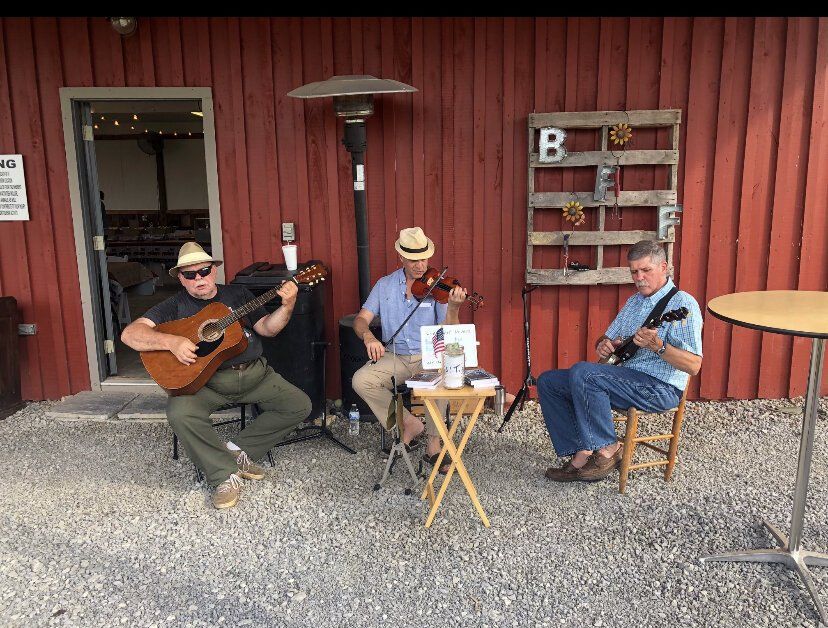 Band playing in outside space
