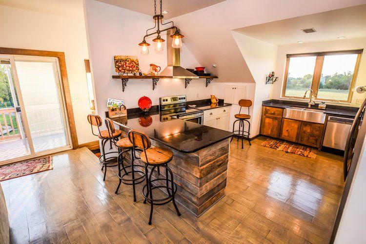 Beautiful kitchen in the Airbnb. It is stocked with everything you need!