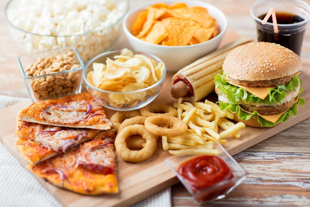There Are Many Different Types of Fast Food on the Table — Michelangelos Pizza & Pasta in Kirwan, QLD