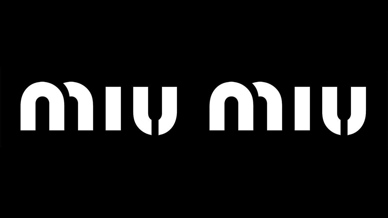 A black background with white letters that say miu miu