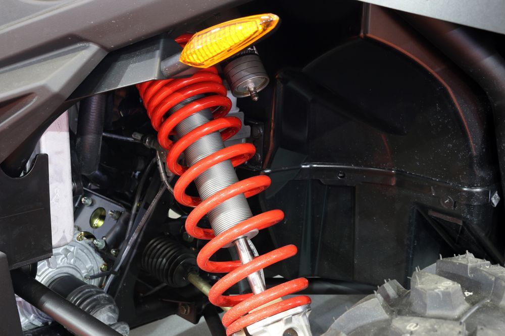 Red Suspension Spring on an Off-road Vehicle — Bob Kolln Automotive In Charmhaven, NSW