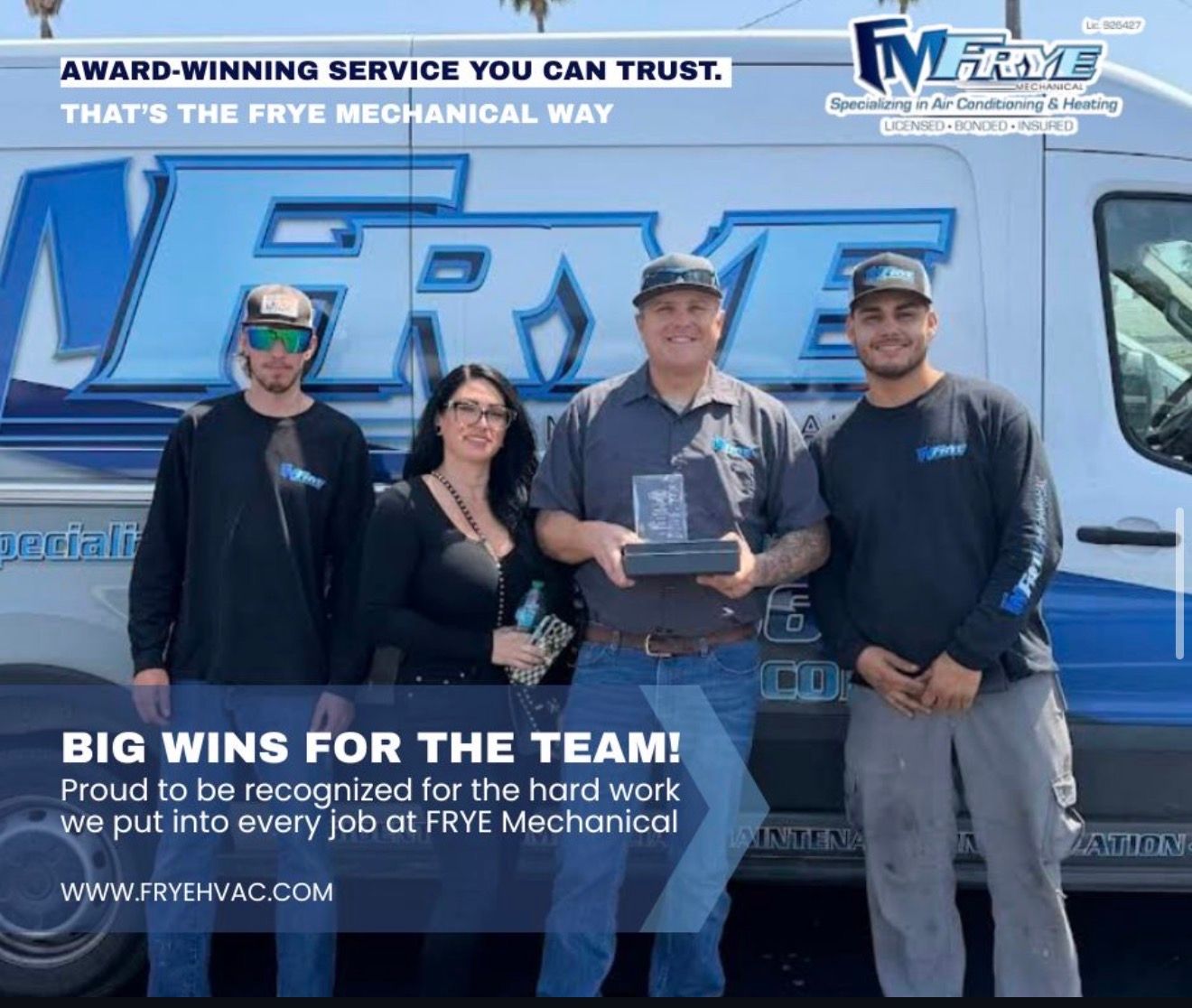 Four employees posing in front of a blue service van holding a plaque, with “Big Wins for the Team!” text.