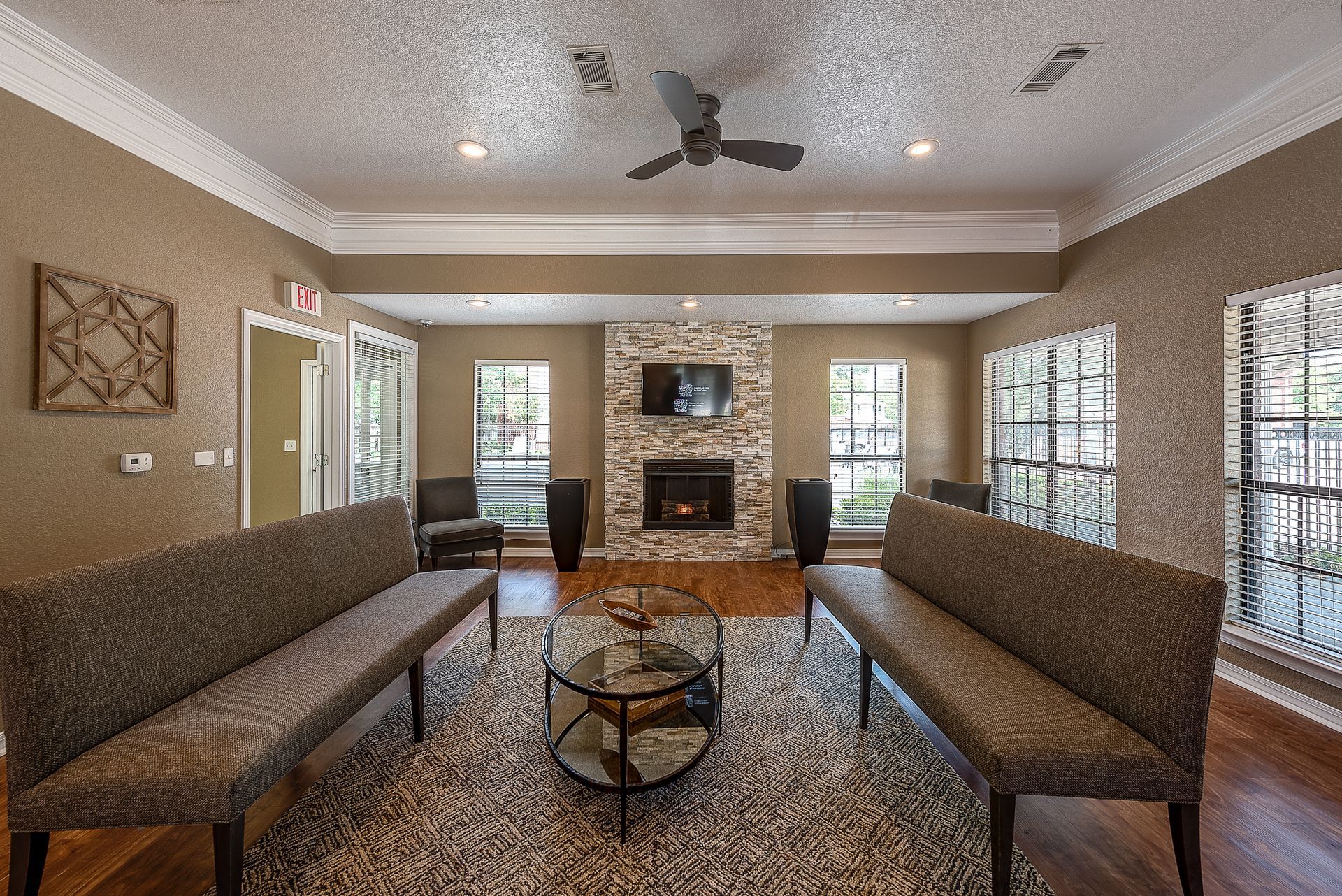 A living room filled with furniture and a fireplace.