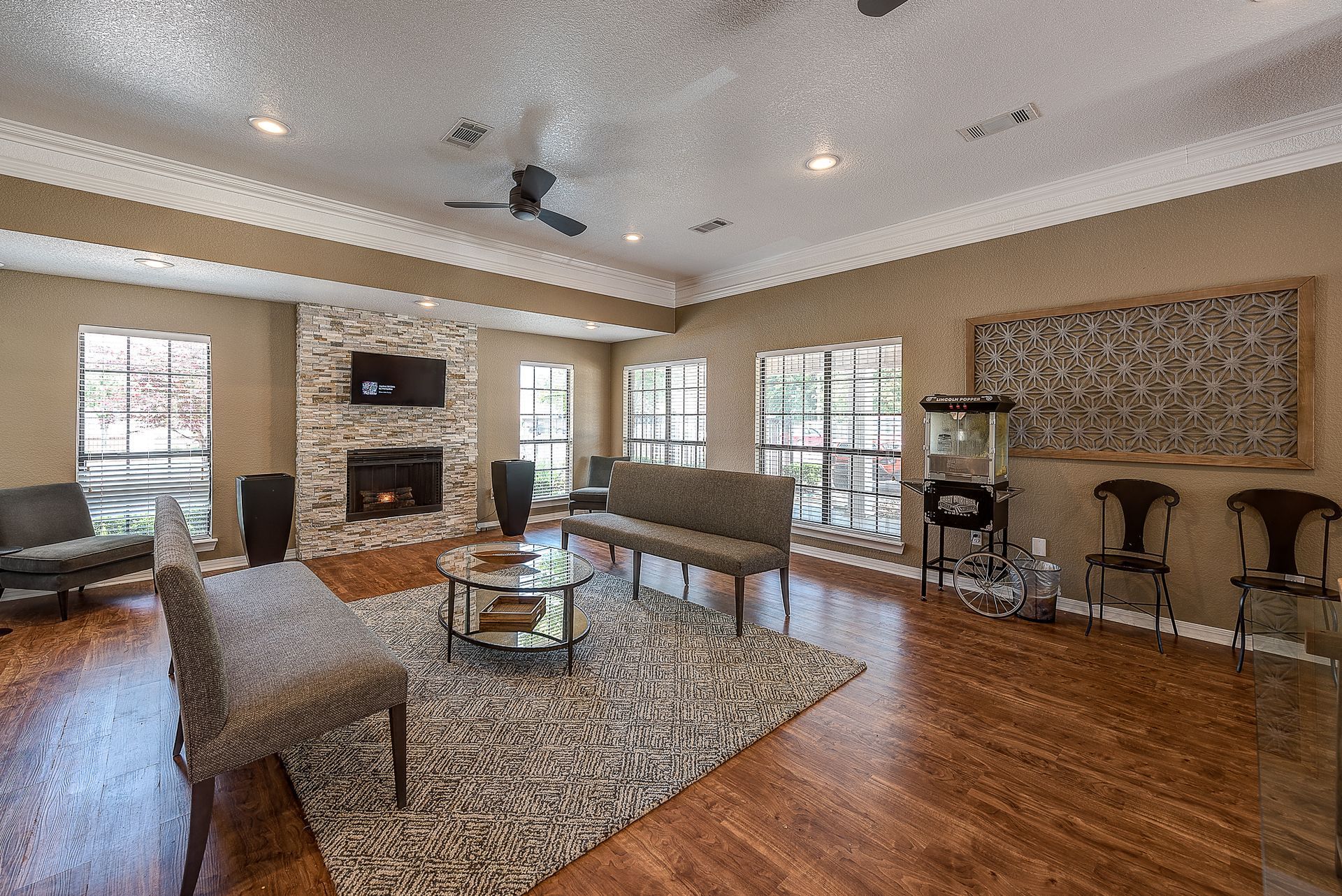 A living room filled with furniture and a fireplace.