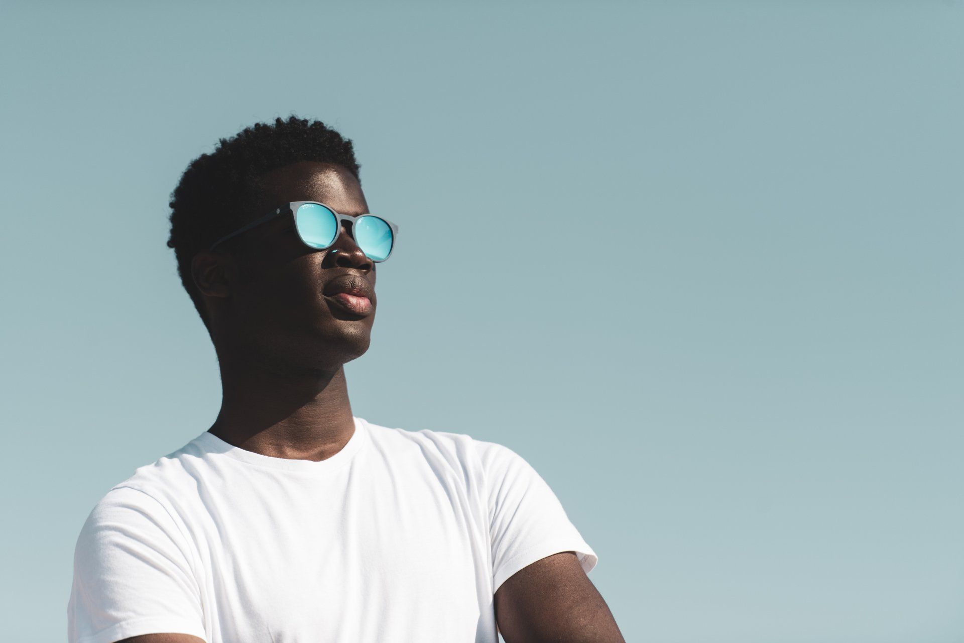 CORAL EYEWEAR person wearing sunglasses