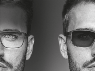 person wearing glasses next to person wearing sunglasses
