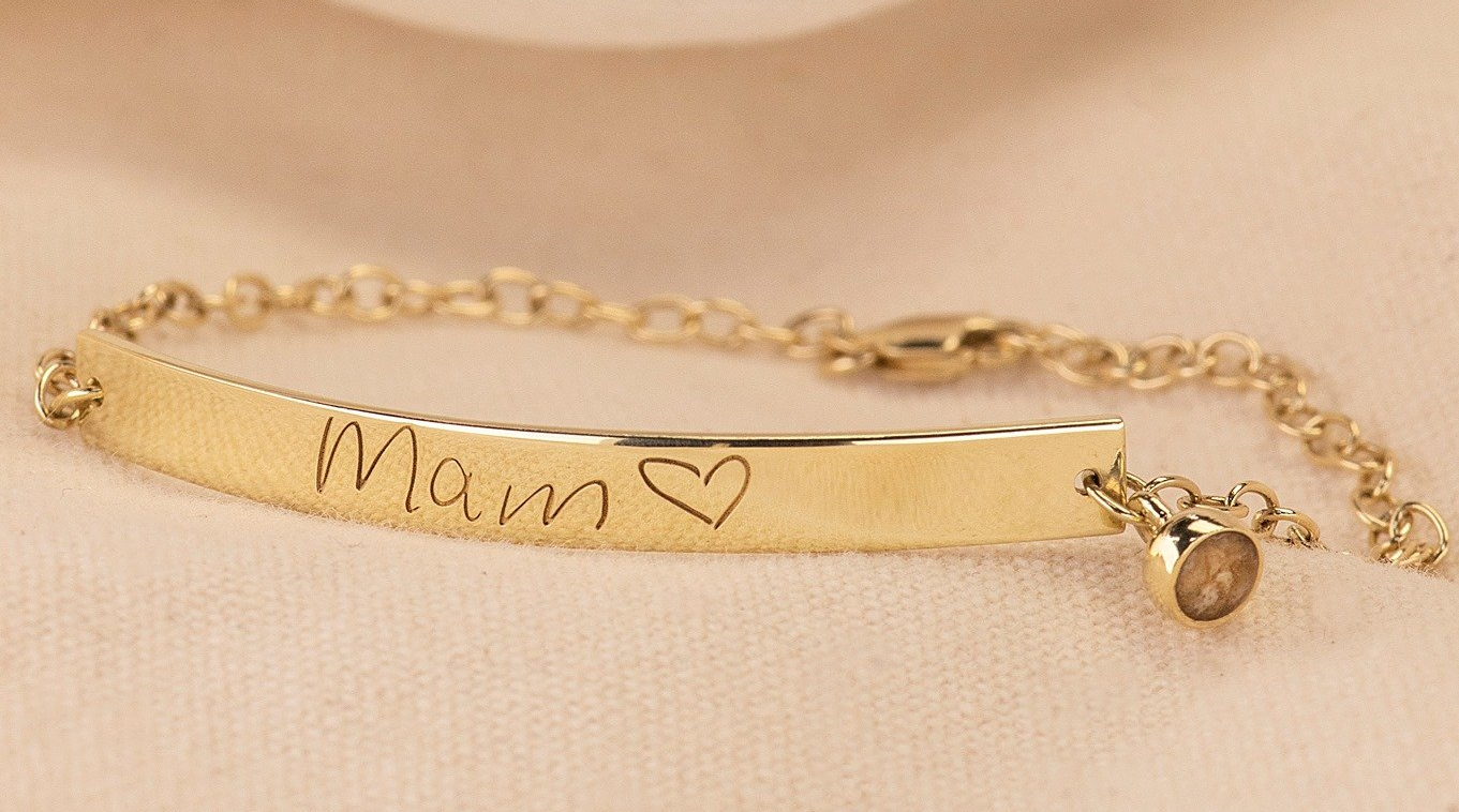 Gouden armband met de inscriptie