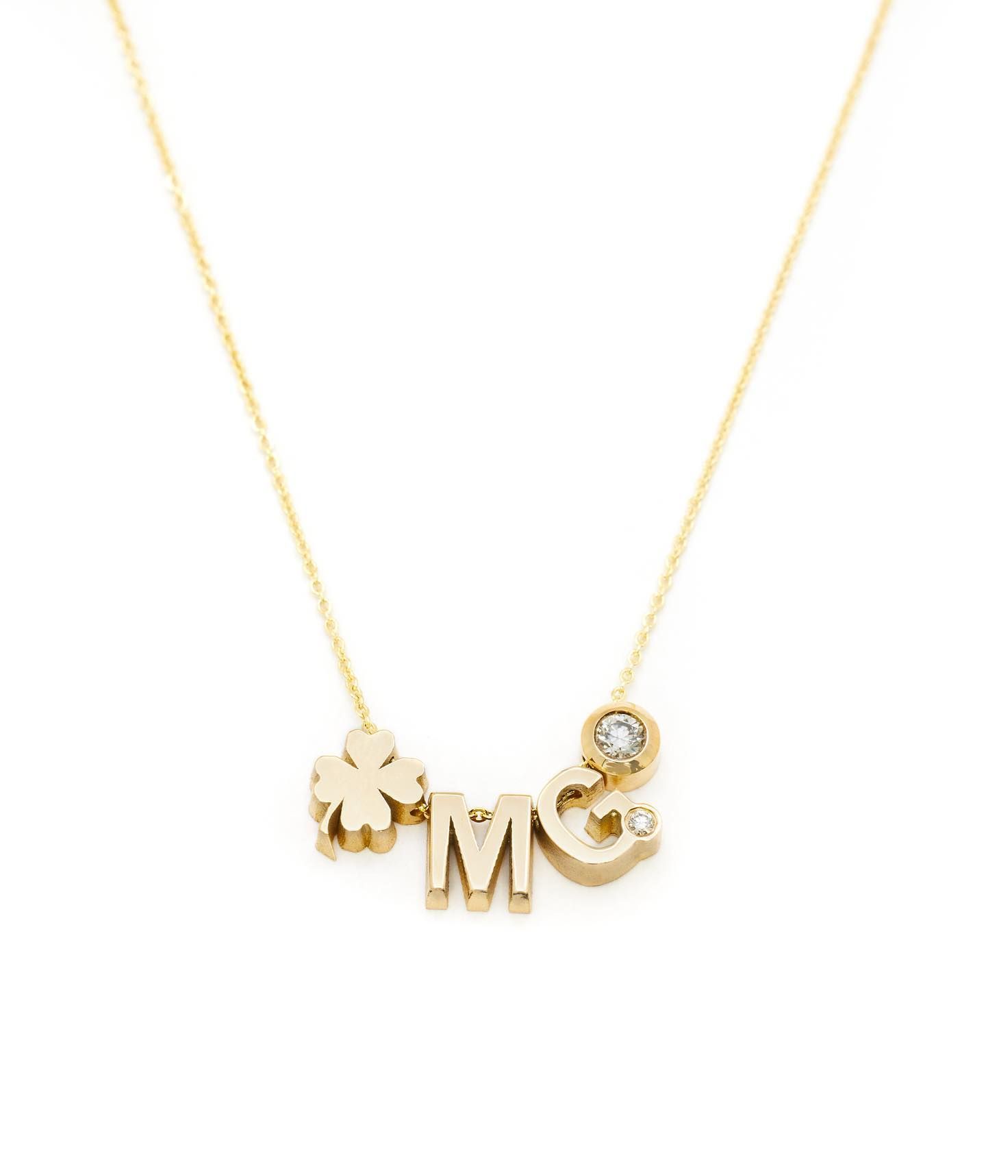 Gouden ketting met klavertjevier, initiaal 