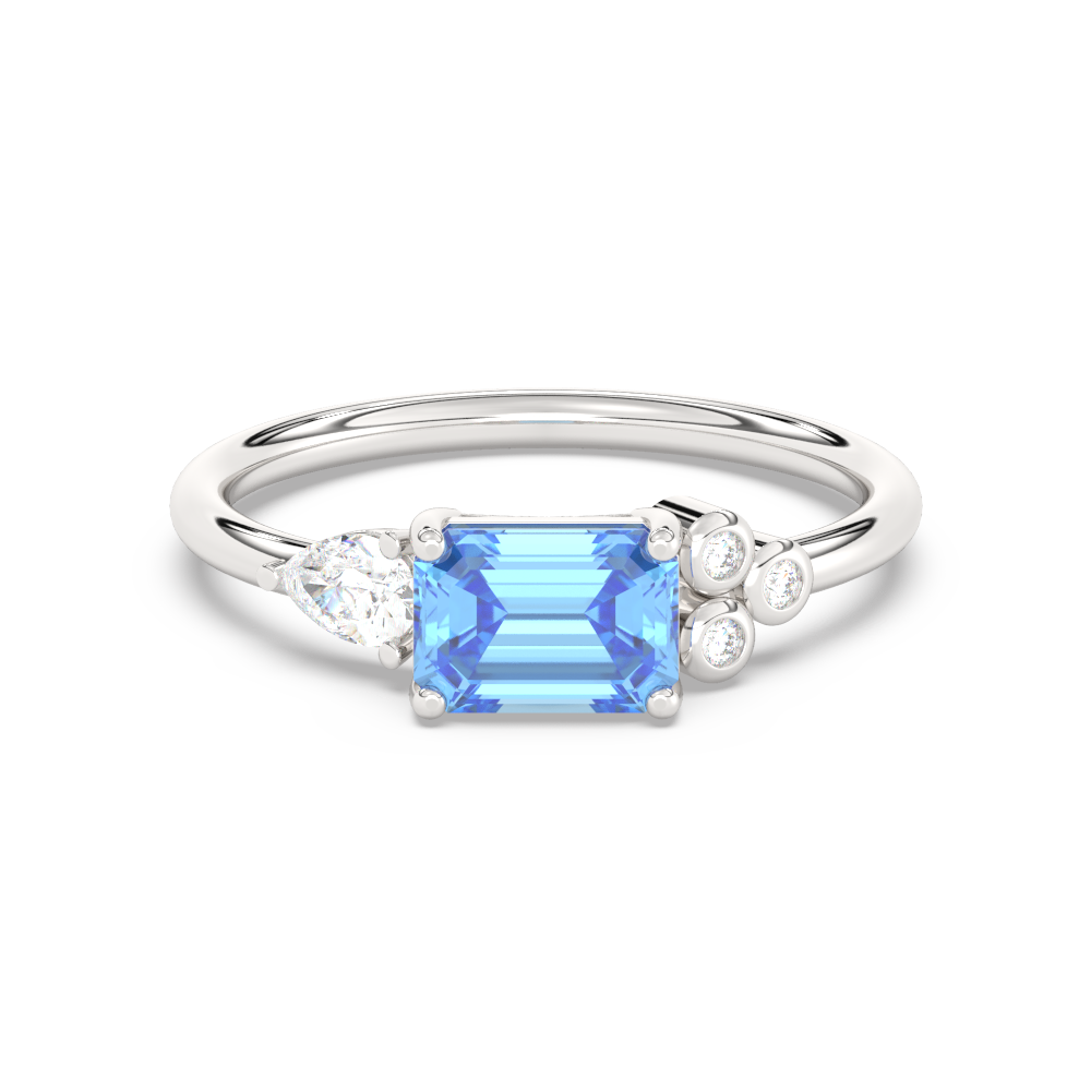 Zilveren ring met een rechthoekige blauwe edelsteen en zijdiamanten.