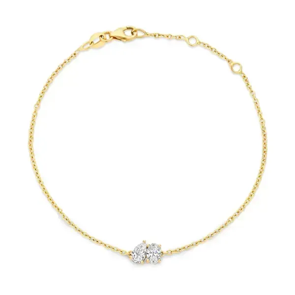 Armband van goud en zilver met ingelegde diamanten.