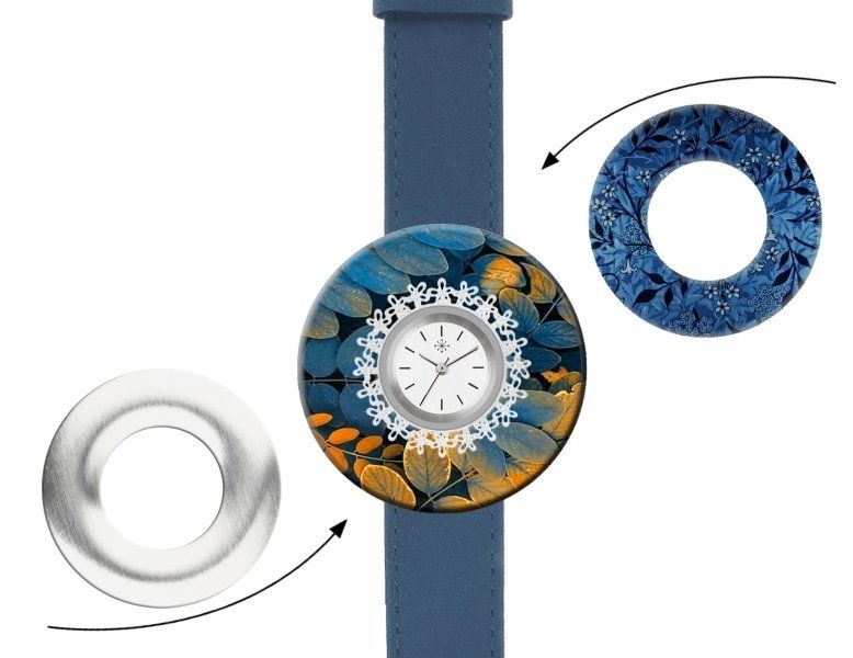Horloge met verwisselbare lunettes, blauwe band, bloemenmotief, zilverkleurige wijzerplaat.