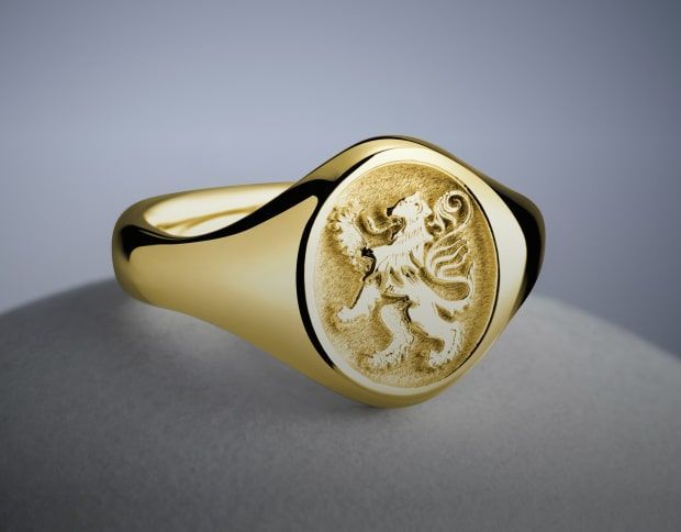 Gouden zegelring met gegraveerd leeuwenwapen.