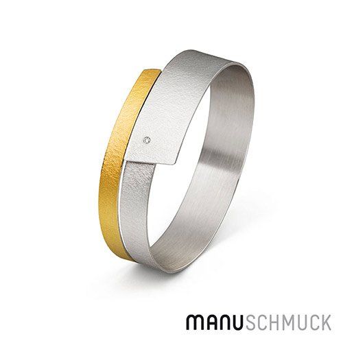 Armband van zilver en goud met een diamantaccent.