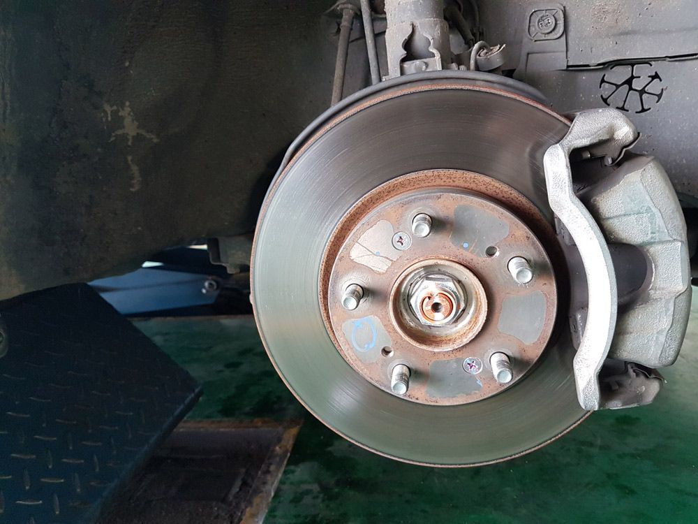 A Close up Of a Brake Disc on A Car — Currajong Brake Parts Pty Ltd In Currajong, QLD