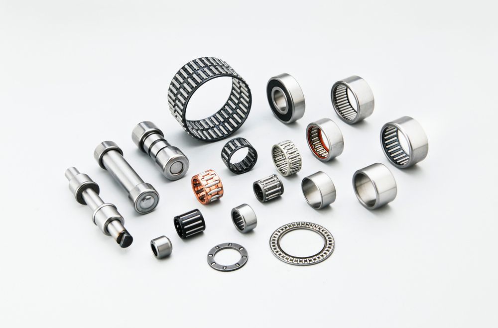 There Are Many Different Types of Bearings on A White Surface — Currajong Brake Parts Pty Ltd In Currajong, QLD