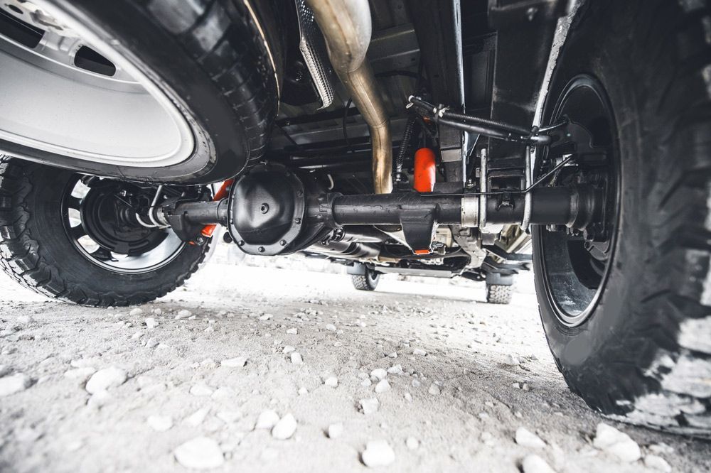 A Close Up Of the Underside of A Truck on A Dirt Road — Currajong Brake Parts Pty Ltd In Currajong, QLD