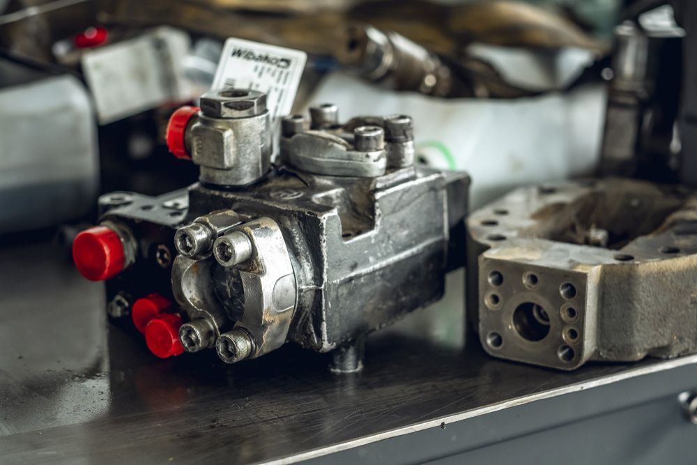 A Close Up Of a Hydraulic Pump on A Table — Currajong Brake Parts Pty Ltd In Currajong, QLD