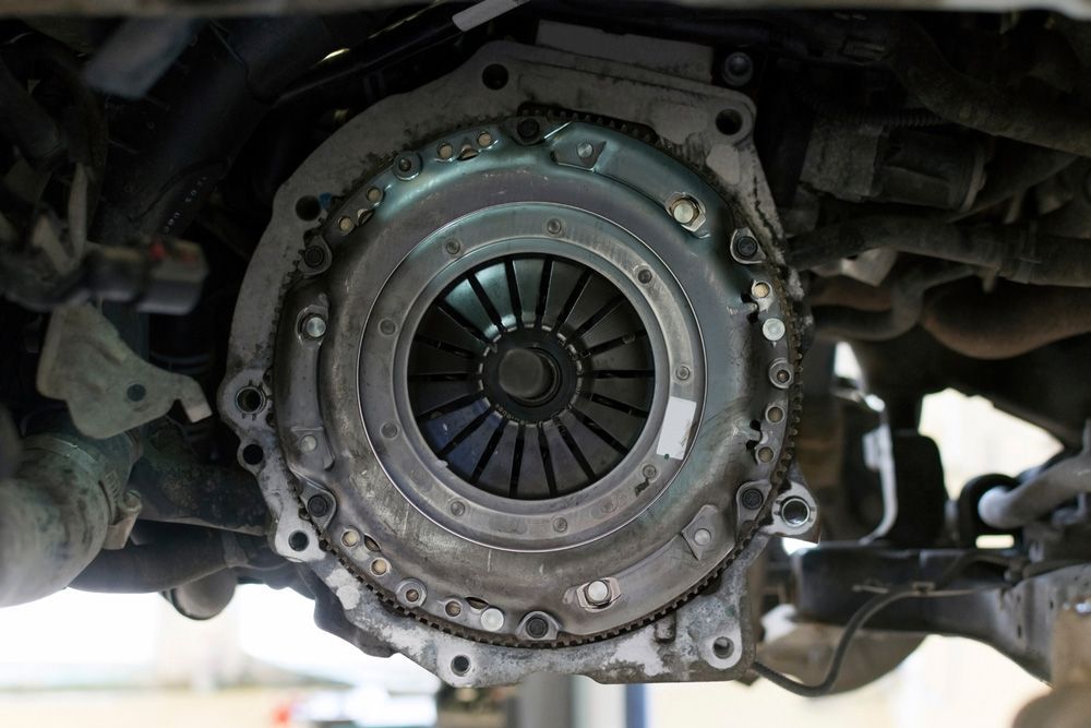 A Close Up Of a Clutch on The Underside of A Car — Currajong Brake Parts Pty Ltd In Currajong, QLD