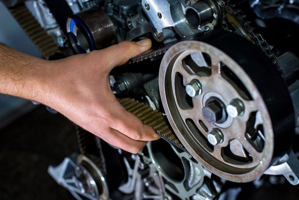 A Close Up Of a Chain and Gear on A Machine — Currajong Brake Parts Pty Ltd In Currajong, QLD