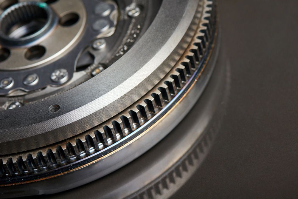 A Close Up Of a Metal Gear on A Black Surface — Currajong Brake Parts Pty Ltd In Currajong, QLD