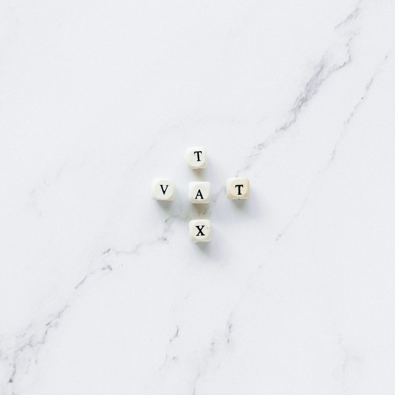 Letter dice spelling tax VAT – bookkeeping and VAT return support for small businesses in Surrey
