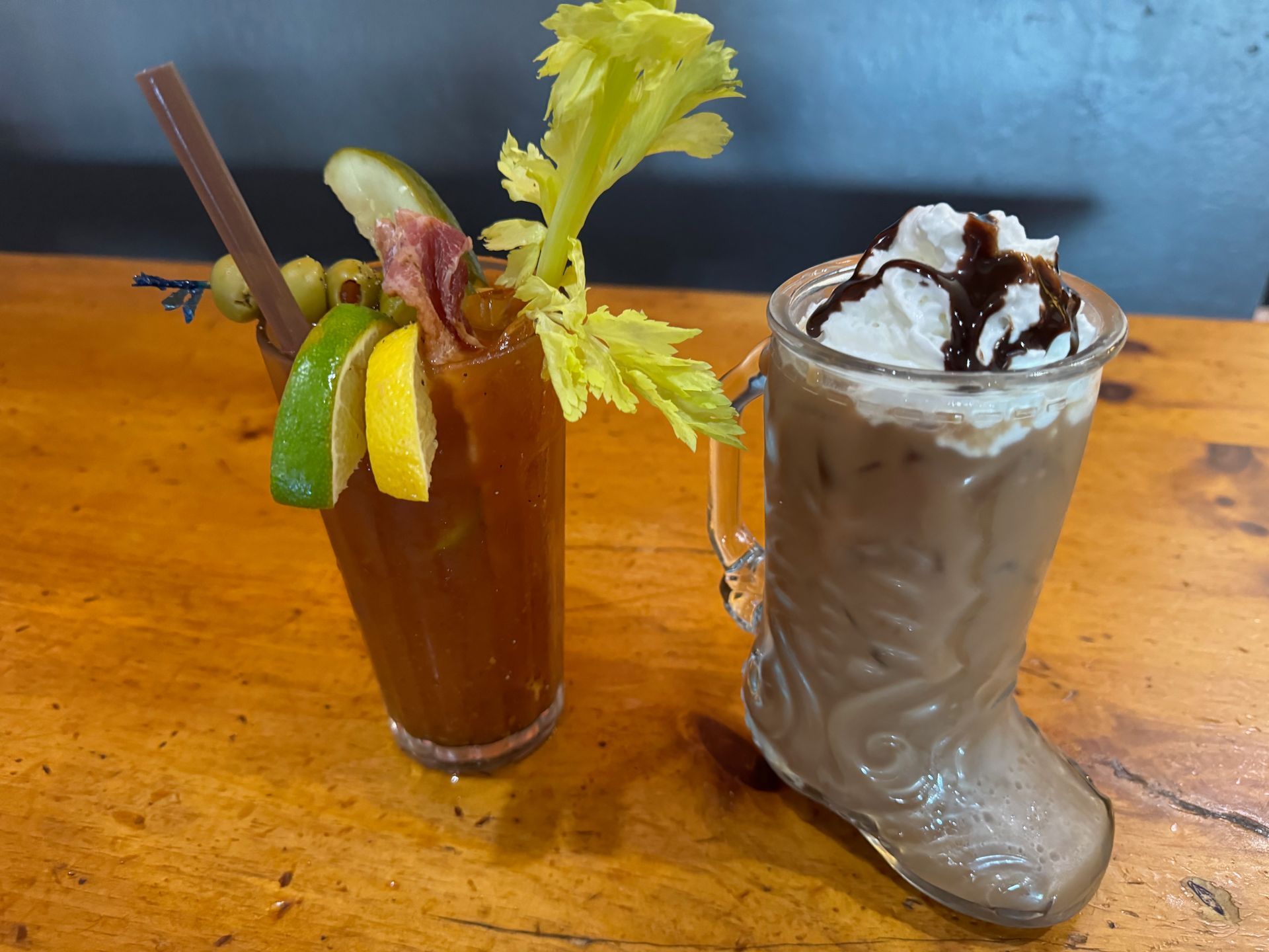 two cocktails on a wooden table