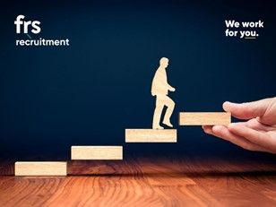 Person climbing wooden steps, hand assisting. Recruitment logo: FRS. Text: We work for you.