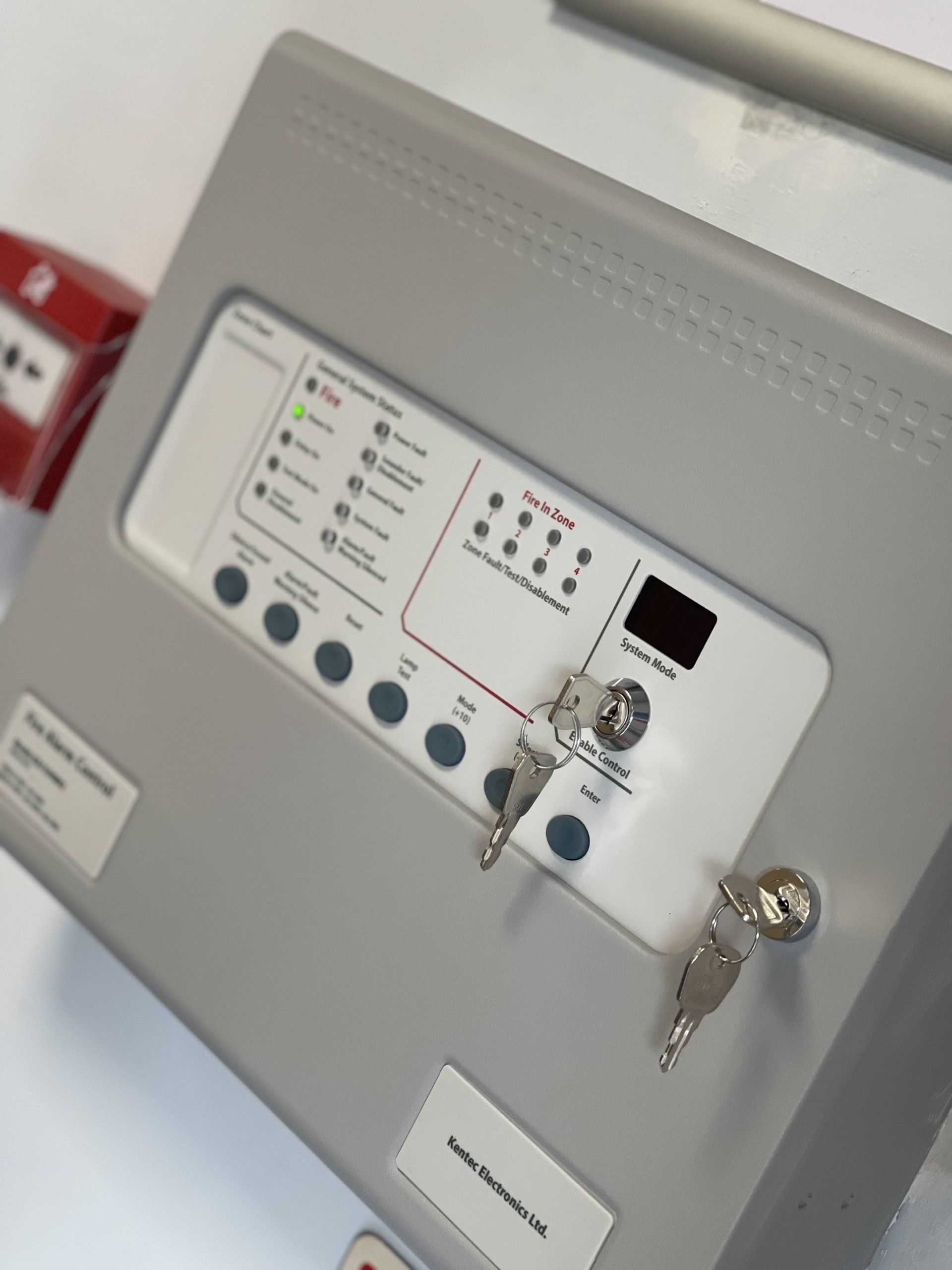 Kentec 2-wire fire alarm panel in an office